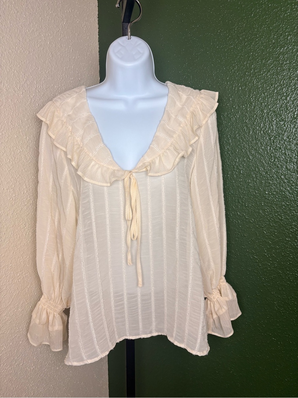 Zara’s Cream Ruffle Tie-Neck Peter Pan Blouse